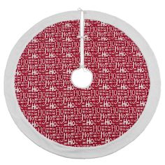 a red and white christmas tree skirt