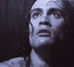 a man with wet hair and no shirt on