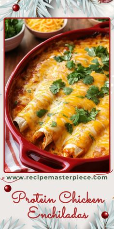 a red casserole dish filled with chicken enchiladas