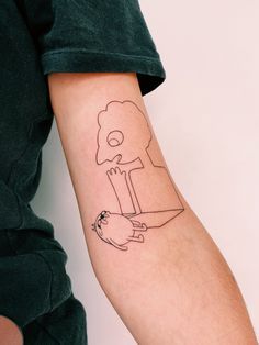 a person with a tattoo on their arm