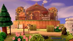 an animated image of a small town in the middle of a field with flowers and trees