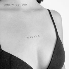 a woman's chest with the word divine written on it in cursive writing