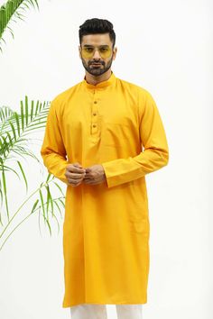 BLUESAANCHI MEN'S YELLOW DESIGNER MATKA SILK KURTA SET  The Bluesaanchi Men's Yellow Designer Matka Silk Kurta Set is a striking blend of tradition and style. With its vibrant yellow hue and premium silk texture, this kurta set offers both comfort and elegance, making it perfect for special occasions and festive celebrations.  Features  Designer yellow Matka silk kurta with intricate detailing  Comfortable fit with a traditional yet modern silhouette  Comes with matching bottoms for a complete s Cotton Traditional Wear With Naqshi For Navratri, Casual Long Sleeve Yellow Kurta, Casual Yellow Long Sleeve Kurta, Casual Yellow Kurta For Eid, Yellow Cotton Kurta With Dabka, Yellow Cotton Kurta With Dabka Detail, Yellow Cotton Kurta With Dabka Embroidery, Yellow Naqshi Straight Kurta, Yellow Straight Kurta With Naqshi