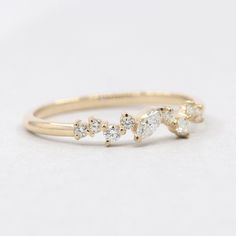 Diamond Wedding Band.14K Solid Gold Cluster Wedding Ring for Women.Stacking Diamond Ring.Dainty Unique Wedding Band.Marquise Diamond Ring. ▷ Metal: Solid 14K Gold ( White Gold, Rose Gold & Yellow Gold ) ▷ Band Height : 1.8 mm ▷ Band Width : 1.5 mm ▷ Diamond Color : G ▷ Diamond Clarity : VS2 ▷ Total Carat Weight : 0.21 ct.(9 Diamonds) ▷ Handmade in the United States ▷ Made to order ▷ Solid gold & Authentic Natural stones More Cluster Ring https://etsy.me/3bl5dfS Wedding Bands: https://ets Multiple Marquise Diamond Ring, Wedding Band Marquise, Cluster Wedding Ring, Unique Wedding Band, Wedding Ring For Women, Marquise Diamond Ring, Women's Rings, Rose Gold Wedding Bands, Bridal Bands