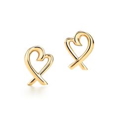 Tiffany & Co. 18K yellow gold Paloma Picasso loving heart stud earrings 3 grams 11mm marked Tiffany & Co. 750 Picasso. Its earring posts and its earring backs are also both marked T & Co. 750. Ready to wear, they will come in a Tiffany pouch and box. Will make a perfect gift or a great addition to a jewelry collection. For more information, please email us. Formal Yellow Gold Pierced Heart Earrings, Classic Yellow Gold Earrings For Valentine's Day, Yellow Gold Open Heart Pierced Earrings, Yellow Gold Hallmarked Heart Earrings, Yellow Gold Earrings For Anniversary On Valentine's Day, Yellow Gold Earrings For Anniversary Or Valentine's Day, Valentine's Day Anniversary Yellow Gold Earrings, Tiffany Gifts, Earrings Tiffany