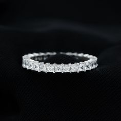 Product Details Full Eternity Ring is encased with sparkling Princess Cut Zircon in the Shared Prong Setting makes a beautiful band. This Zircon Full Eternity Ring is composed of Solid Gold metal. Product Information SKU SHP-RINGS102022803 Width 1.4 mm Height 2 mm Weight 1.60 gm (Approximate) ZIRCON INFORMATION No.of Stones 29 Pieces Total Weight 1.60 Carat (Approximate) Dimension(approx) Princess Cut-2X2 mm-29 Pcs Color White Cut Brilliant Shape Princess Cut Setting Type Shared-Prong-Setting Qu Cubic Zirconia Baguette Cut Eternity Band, Cubic Zirconia Stackable Rings For Anniversary, Emerald Cut Cubic Zirconia Eternity Band With Prong Setting, Emerald Cut Diamond Eternity Band For Promise Ring, Diamond White Cubic Zirconia Asscher Cut Eternity Band, Diamond White Asscher Cut Eternity Band, Emerald Cut Cubic Zirconia Half Eternity Diamond Ring, Cubic Zirconia Emerald Cut Half Eternity Ring, Emerald Cut Cubic Zirconia Half Eternity Ring