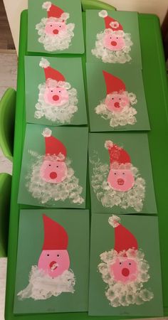 four cards with pictures of pigs in santa hats on them, and one pig is wearing a santa hat