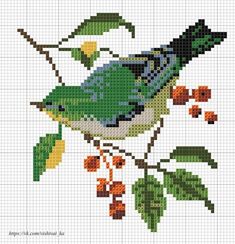 a cross stitch bird sitting on top of a tree branch