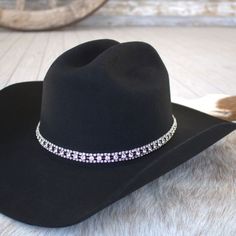 1 UnitThis rhinestone strand hatband comes with 3 layers of clear rhinestones set on silver metal. It is adjustable with a metal clasp in the back. Fits up to size 7 1/2 hat. Includes 1 Rhinestone Hat Band Clear Rhinestones Width: Approximately 1/2" *Hat not included* CA Residents: Prop 65 Warning ↗️ Bedazzled Cowboy Hat, Rhinestone Hat, Luncheon Ideas, Bling Hat, Cowboy Hat Bands, Hat Band, Cowboy Hat, 3 Layers, Clear Rhinestones