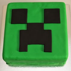 a cake made to look like a creeper from the video game, minecraft