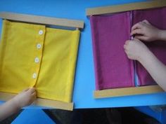 two people are cutting out different colored pieces of paper