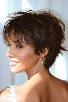 33 Gorgeous Pixie Haircuts for 2024 - The Hairstyle Edit Haircuts To Grow Out A Pixie, Long Pixie Haircut Back View, Rounded Pixie Haircut, Short Haircuts With Highlights Brunettes, Short Woman Hairstyle, Chic Short Haircuts For Thick Hair, Piecy Pixie Haircut, Pixie Brunette Hair, Short Haircuts For Frizzy Wavy Hair