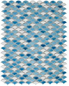 blue and white mosaic tile with wavy waves on the bottom, in an irregular pattern