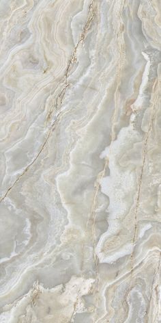 an image of marble that looks like it has been painted white and grey with gold accents