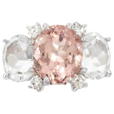 Medium 18kt white gold GUM DROP™ ring with morganite (approximately 5 cts), white topaz (approximately 4 cts each), and 4 diamonds weighing 0.48 cts. Specifications: Length: 7/8" Width: 9/16" The ring can be sized or ordered to your ring size. The GUM DROP™ Ring Collection can be made in any color stone combination in either Yellow White or Rose gold. Please contact me with any inquiries you may have. Best, Christina Gum Drop, Kunzite Ring, Sunstone Jewelry, Drop Ring, Red Stone Ring, White Diamond Ring, Morganite Ring, White Jewelry, Three Stone Rings