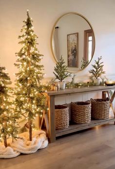 christmas trees and baskets in front of a mirror