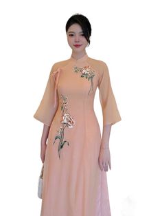 "🌿 This set includes Ao Dai, pants. Style: modern Material: Very well made with high-quality silk Collar: traditional collar Ao dai length: 130cm Pants length: 105cm Please provide bust-waist-and hip measurements when placing your order to ensure the best fit for you. 🌿 NOTE: * Recommend gentle washing * Please contact us for any inquiries about size. We don't have an exchange policy for the wrong size * It is safe for a washer and dryer in a \"delicate\" setting. * Actual Ao Dai colors may di Modern Ao Dai, Vietnamese Ao Dai, Sewing Sleeves, Pants Style, Pants Length, Ao Dai, Lunar New, Washer And Dryer, Modern Materials