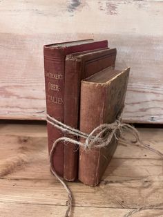 two old books tied together with twine