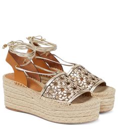 Uplift your warm-weather wardrobe with these espadrille wedges from Tory Burch. Set atop jute-wrapped platform soles, they have woven metallic leather uppers and bead-trimmed ties that wrap around the ankles. | Tory Burch Leather platform espadrilles Bag And Shoes Closet, Espadrilles Outfit, Rose Gold Accessories, Platform Espadrilles, Shoe Closet, Espadrille Shoes, Wedge Espadrille, Espadrilles Wedges, Metallic Leather