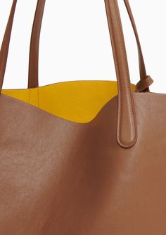 Easily carry it all in the Everyday Soft Tote by Mansur Gavriel. Crafted from supple Italian calf leather, reinforced handles, and room for a 16” laptop, it's your versatile and spacious companion. Composition: 100% Italian Soft Calf Leather Dimensions: 21.5 x 11.8 x 9 in Handle drop: 9.8" Made in Italy Farmhouse Pottery, Vintage Wedding Gifts, Louise Roe, Jerome Dreyfuss, Accessories Bags Shoes, Nyc Trip, Mansur Gavriel, Linen Shop, Summer Staples