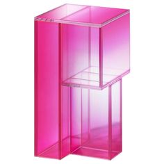 two pink plastic containers stacked on top of each other in front of a white background