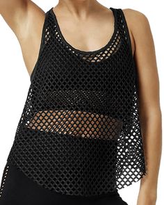 PRICES MAY VARY. CLASSIC FISHNET TANK TOPS: Made of high quality polyester material. Fishnet construction, scoop neck & racerback silhouette with mesh top, keep 80'S classic also adds a sense of morden fashion to the tops, which is more visually appealing. MOVE AS YOU LIKE: Fishnet top offers impressive ventilation. In addition to keeping you cool, it also ensures optimal comfort and coverage with its loose-fitting design. To feel less stuffy, whether it's on the court or strutting to lunch. ANY Madonna Outfits, Fishnet Shirt, Fishnet Top, Loose Tank Tops, Mesh Tank Top, Going Out Tops, Womens Activewear, Tops For Women, Leisure Wear