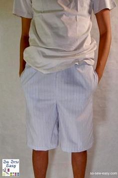 a man wearing shorts with the words men's pajama shorts with pockets