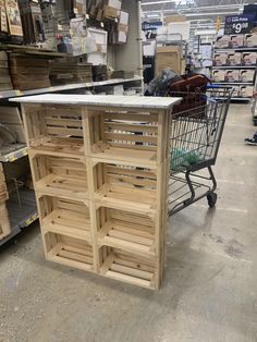 a shopping cart in a store filled with wooden crates