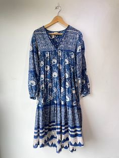 Matta Blue Block Print Dress. Amazing flowy and semi-sheer dress, perfect for layering or just throwing on over a bikini! Reminiscent of Hawaiian print with cute string detailing. In excellent condition. Marked size S. Unmarked materials, feels like cotton. Dry clean or machine wash cold, lay flat to dry. Approx. Measurements: Underarm to underarm: 20" Length: 45" Bohemian Blue Printed Midi Dress, Blue Printed Bohemian Midi Dress, Blue Bohemian Printed Midi Dress, Blue Cotton Dress For Vacation, Indigo Bohemian Maxi Dress For Summer, Indigo Bohemian Festival Dress, Indigo Bohemian Dress For Festival, Blue Cotton Tunic Dress, Bohemian Block Print Midi Dress For Vacation