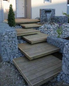 wooden steps leading up to a white house