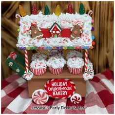 a holiday gingerbread bakery with cupcakes and candy