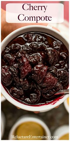 a bowl filled with cherries and the words cherry compote in front of it