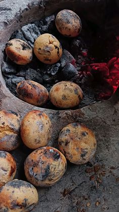 some food is being cooked over an open fire