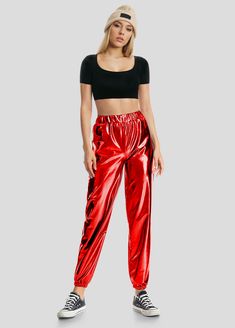 These metallic jogger pants are crafted from a blend of 90% nylon and 10% spandex, offering a stylish, high-shine finish. The fabric provides flexibility and comfort with a relaxed fit, making them perfect for both hip-hop streetwear and casual club looks. The elastic waistband and cuffs give them a snug, secure fit, while the glossy texture adds a bold, statement-making touch to any outfit. High-Waist Two functional side pockets Stretch & Comfort 90% Polyamide / 10% Spandex Imported Metallic Stretch Casual Pants, Casual Metallic Stretch Pants, Casual Shiny Metallic Bottoms, Metallic Leotard, Kids Leotards, Metallic Bodysuit, Leotard Dress, Long Sleeve Leotard, Metallic Leggings