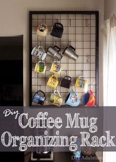 coffee mugs are organized on a rack with the words diy coffee mug organizing rack