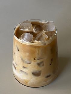 an iced drink in a glass with ice cubes