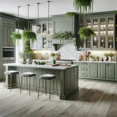 a large kitchen with green cabinets and white counter tops, plants hanging from the ceiling