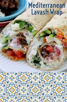 there is a plate with some food on it and the words mediterranean lavash wrap