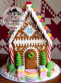 a gingerbread house decorated with candy and icing