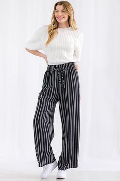 Made In U.S.A S.M.L Featuring wide legs to offer room and comfort for anyone who wears it as well as a functional drawstring - these super cute pants will draw attention from others a breathe of relief for the wearer! 100% Polyester Black CYF Thira Stripe Wide Leg Pants Item Measurements: SIZE S Measurements: SIZE S Inseam:27" Length:38.5" Hips:36" Rise:11.5" Black Striped Pants, Striped Wide Leg Pants, Cute Pants, Wide Legs, Striped Pants, Favorite Shirts, Lifestyle Blogger, Boutique Clothing, Denim Dress