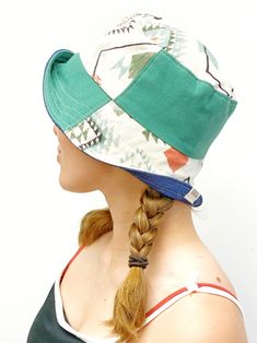 Bucket Hat for Girls or Women's Patchwork pattern with dark green with all denim blue on reverse REVERSIBLE HatSize: Small Ready to Ship in 1-2 business days -----------------------------------------OVERVIEWGive your daughter the gift of being herself and not being afraid to show it! a Bucket hat just her size that'll emphasize her personality and charm. Reversible cuteness that's delightful on both sides. The pliable brim allows for different ways to shape the brim to desired mood. Wear it completely down or flip it up all around or do a partial flip - all your coffee pals just may be jealous. BENEFITS & FEATURESPerfect for outing with friends, beach, ball games or walk around the lakeShade from the sun that doesn't look obnoxiousFashionable summer hatPliable, flexible brimReversibleFolda Adjustable Reversible Bucket Hat With Short Brim, Casual Handmade One-size Bucket Hat, Adjustable Reversible Multicolor Bucket Hat, Playful Bucket Hat With Short Brim, One Size, Adjustable 5-panel Bucket Hat For The Beach, Patchwork Bucket Hat, Bucket Hat Winter, Winter Bucket Hat, Bucket Hat Summer