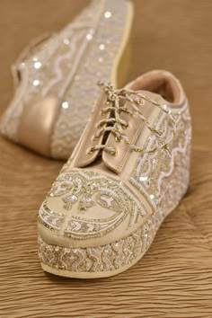 Ivory sneakers with bead, sequin, thread embroidery in peacock pattern. - Aza Fashions Embroidery Sneakers, Bride Sneakers, Wedding Footwear, Whimsical Shoes, Bride Sandals, Embroidered Sneakers, Bridal Sneakers, Bridal Jewelry Sets Brides, Indian Shoes