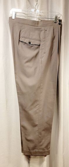 Extraordinary light weight fabric reverse pleats, button fly, inside adjustable waist straps, great color. Unique pair of trousers ready for your wardrobe perfect for that Sportscoat. Condition: appears in great condition with no apparent issues, please view photos. Measures  Waist 36 inches  Inseam 29 inches Outseam 41 inches Cuff 1 3/4 inches. We exam each item and describe to the best of our knowledge ~ exact age is unknown ~ All vintage items at times may have slight imperfections such snag, Lake Elsinore, Grey Trousers, Mens Trousers, View Photos, Vintage Men, Mens Pants, Vintage Items, Im Not Perfect, Trousers