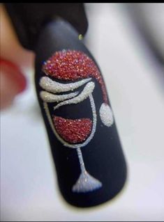 Discover the top Christmas nail art trends for 2024! From holographic designs to cute holiday accents, these nails are perfect for celebrating the season in style. ✨🎁 #ChristmasNails #HolidayNailArt #NailArtTrends Nails With Wine Glass Design, Christmas Glass Nails, Nail Art Natale, Wine Glass Nails, Wine Glass Nail Art, Xmas Nails Simple, December Nails Simple