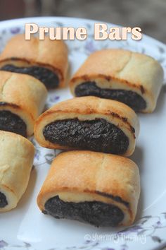 small pastries on a plate with the words prune bars