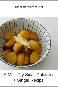 a bowl filled with potatoes and onions on top of a table next to a sign that says, must try small potatoes + ginger recipe