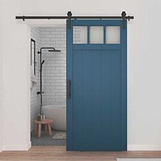 an open door leading to a bathroom with white tile walls and wooden floors in the background