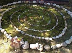 a circular garden design made out of rocks