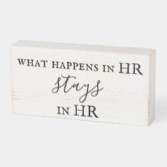 a wooden block that says, what happens in hr stays in hr