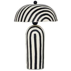 a black and white lamp with a striped shade on it's base is shown in front of a white background